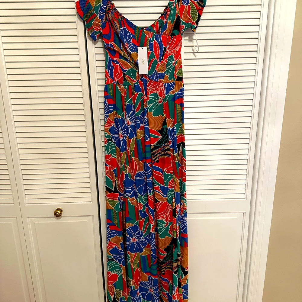 Cute summer dress colors are more vibrant than in photo. Great for vacation.